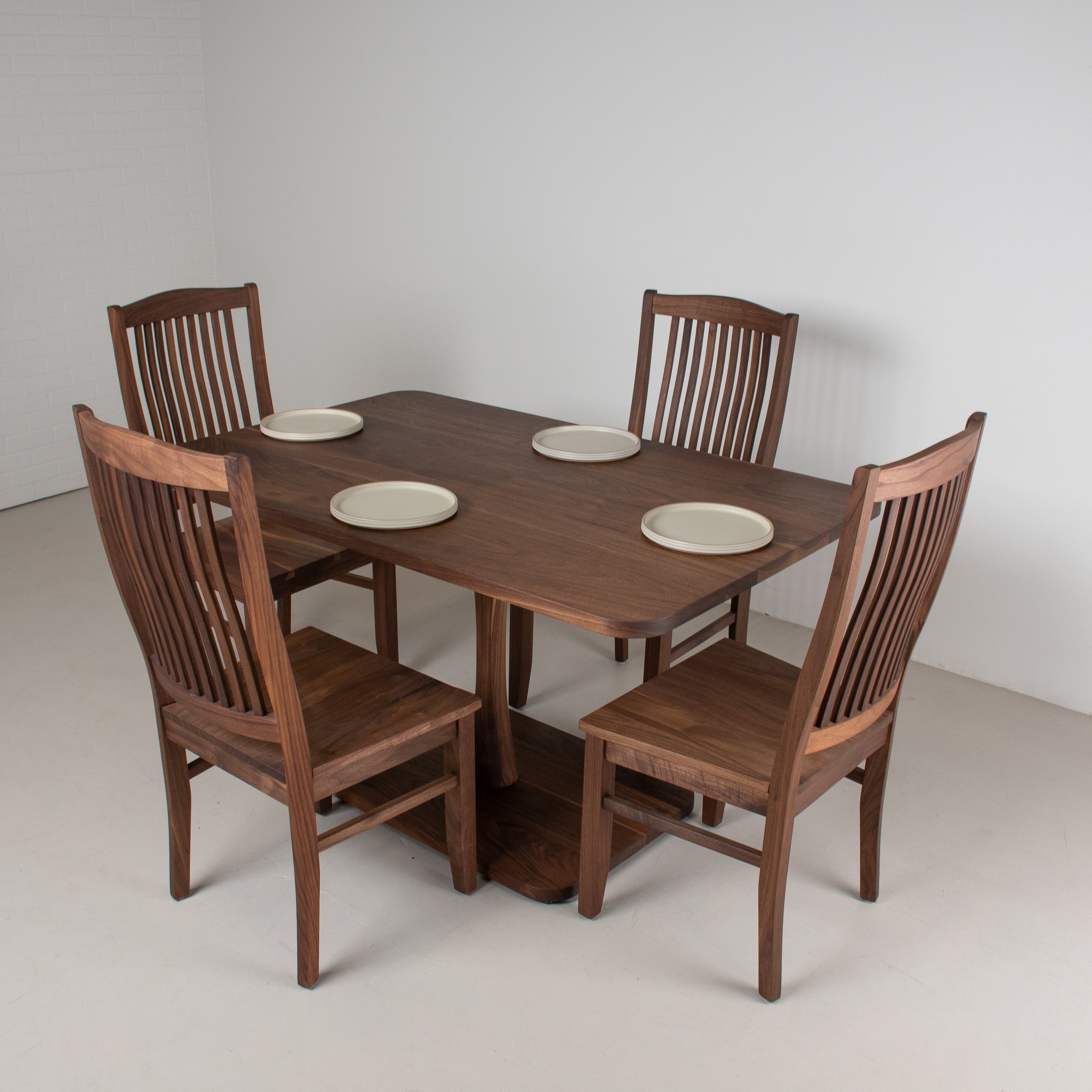 small pedestal table with chairs