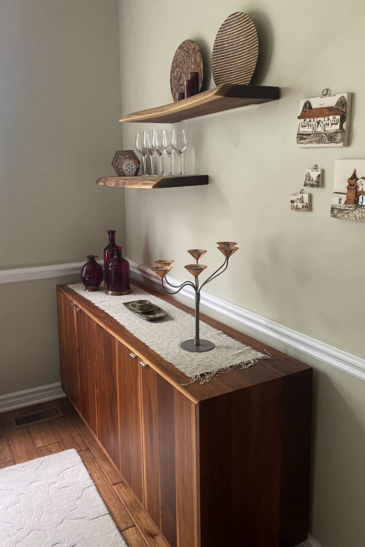 walnut sideboard and floating shelves