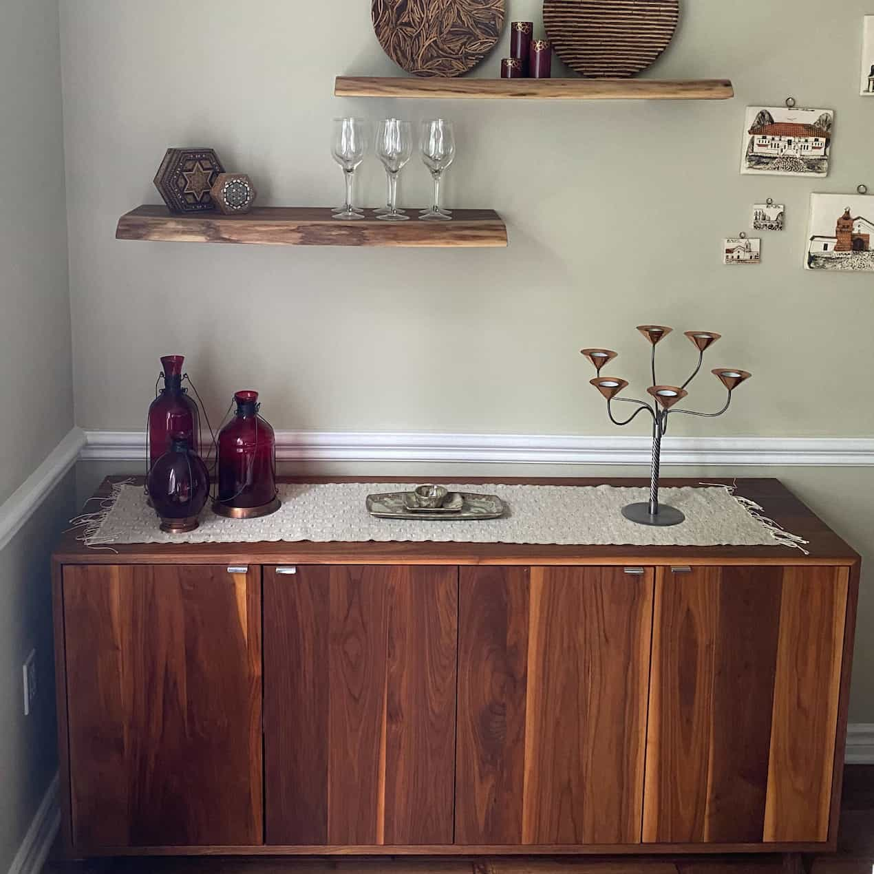 walnut sideboard and floating shelves