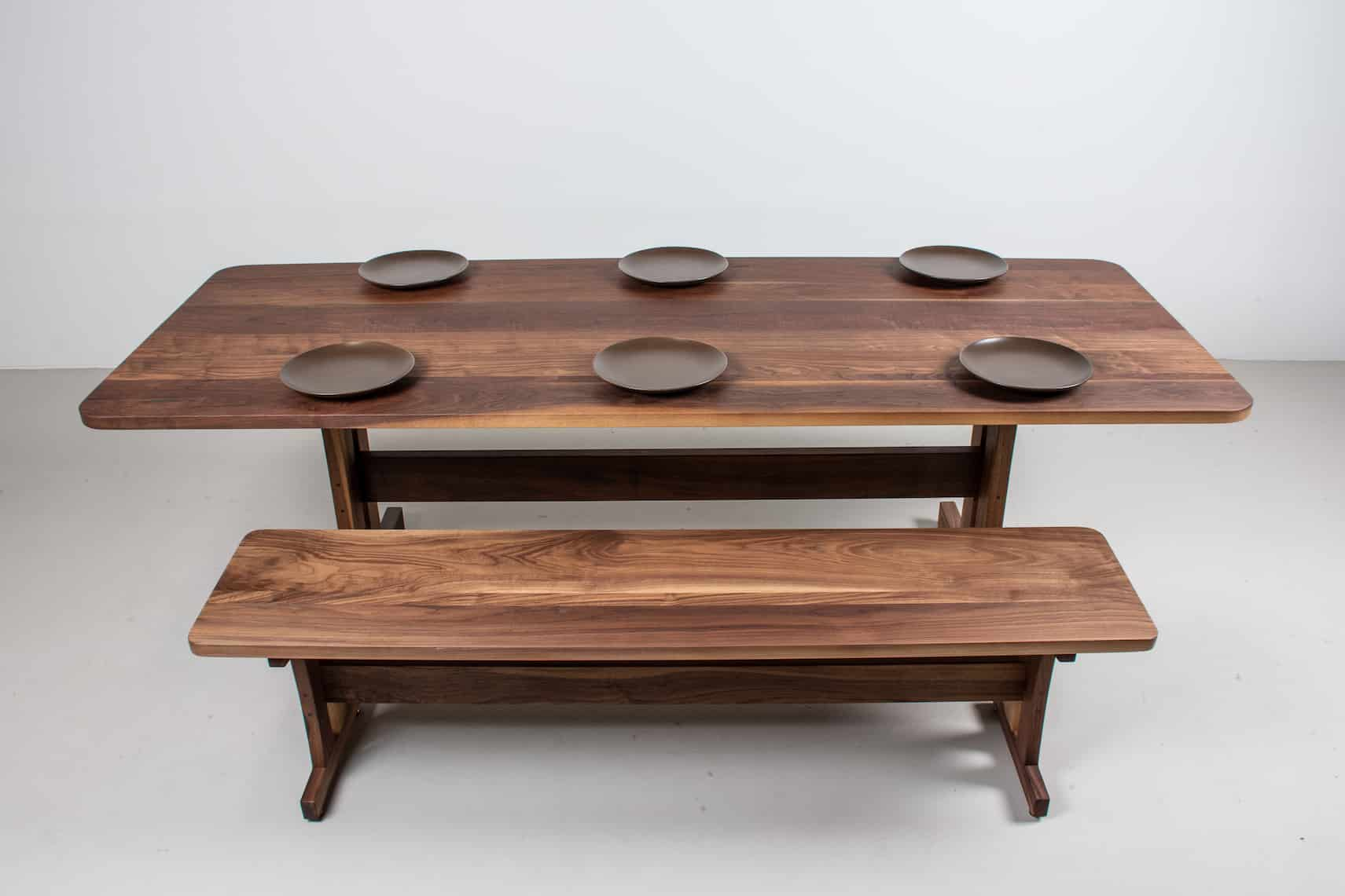 walnut table and bench