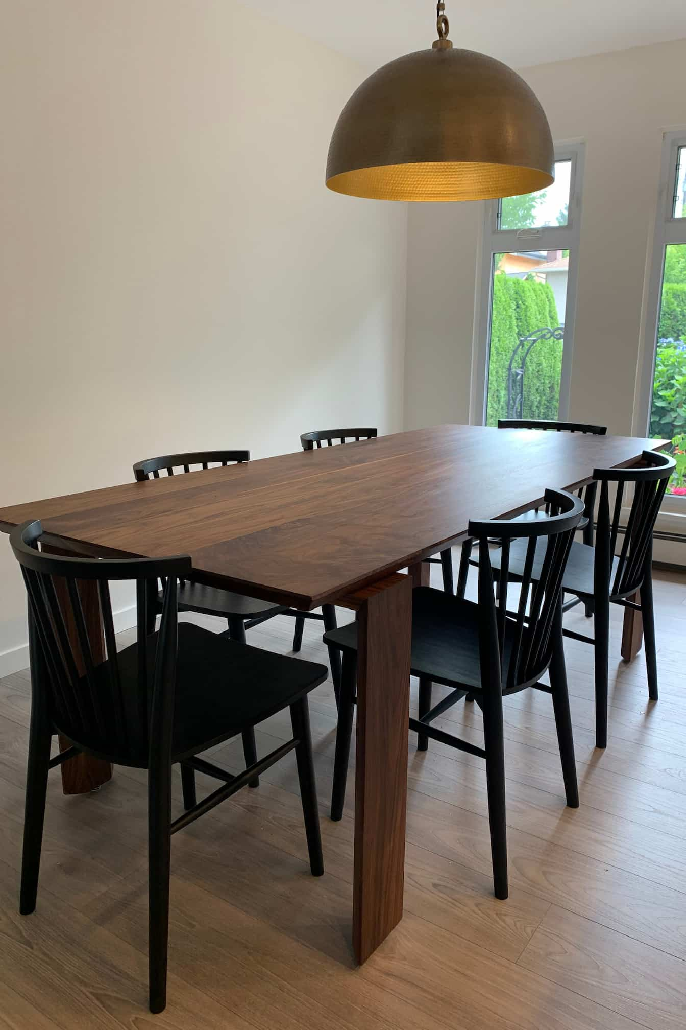 custom walnut table with floating legs