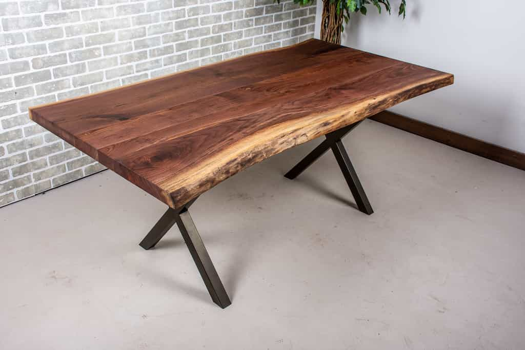 walnut table on bronze legs