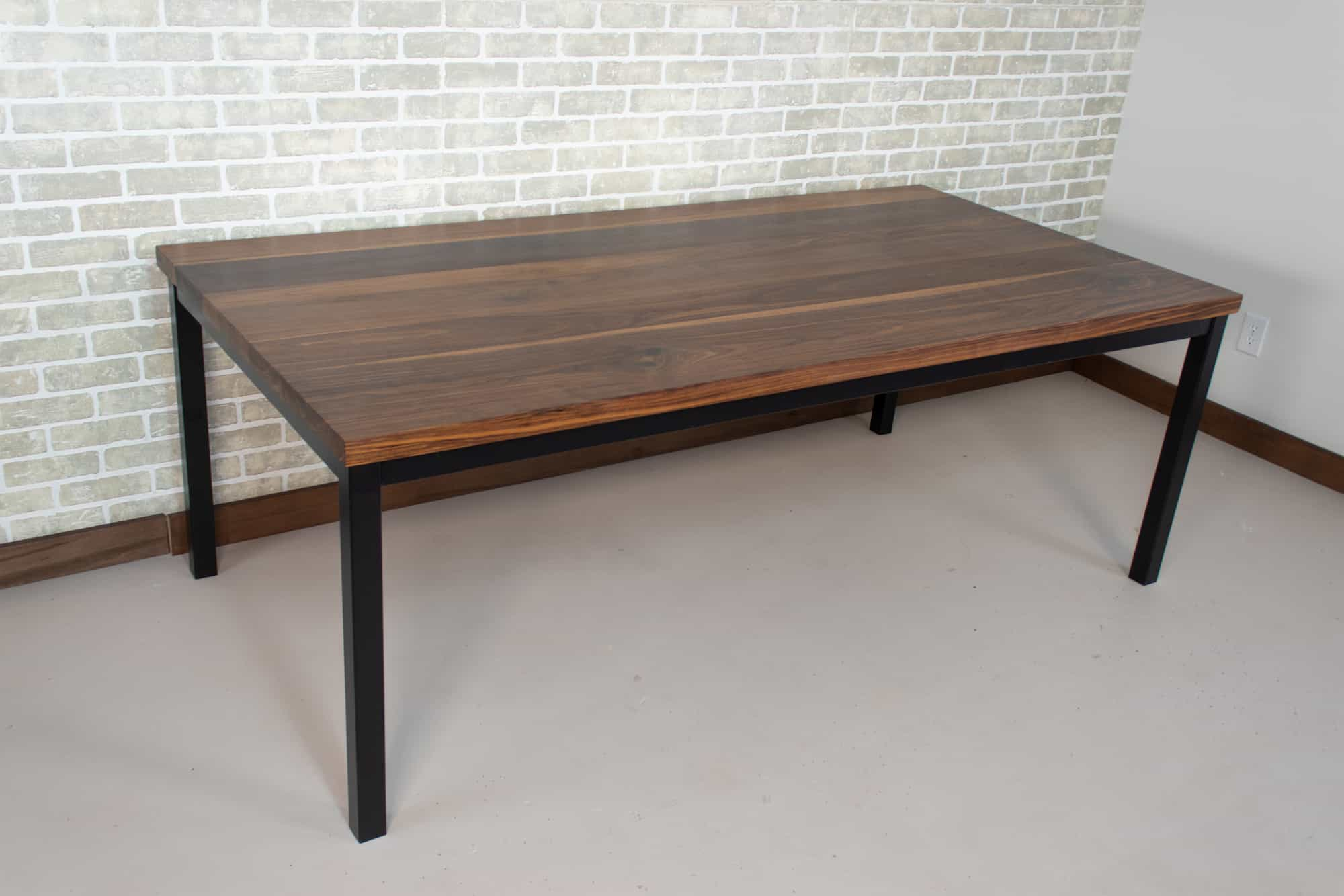 walnut table on steel parson base