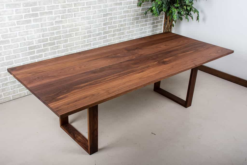 walnut table on walnut legs