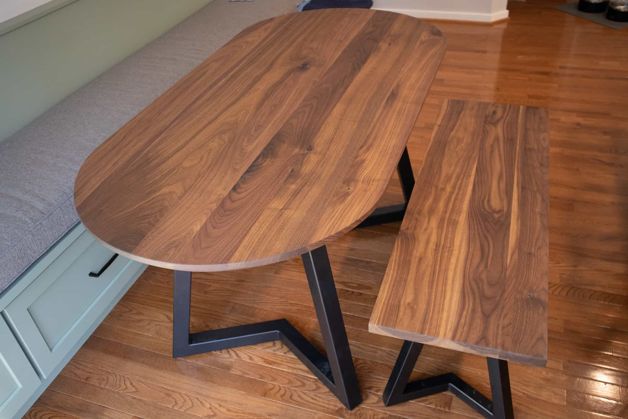 oval walnut table with bench