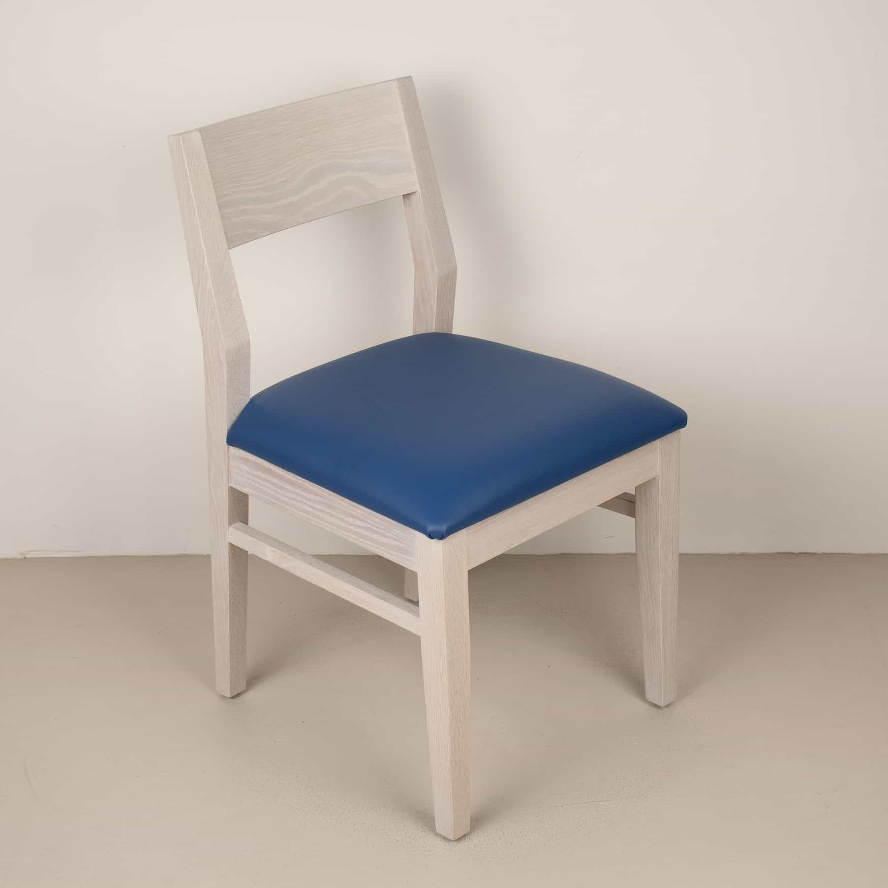 white dining chair with blueberry colored seat