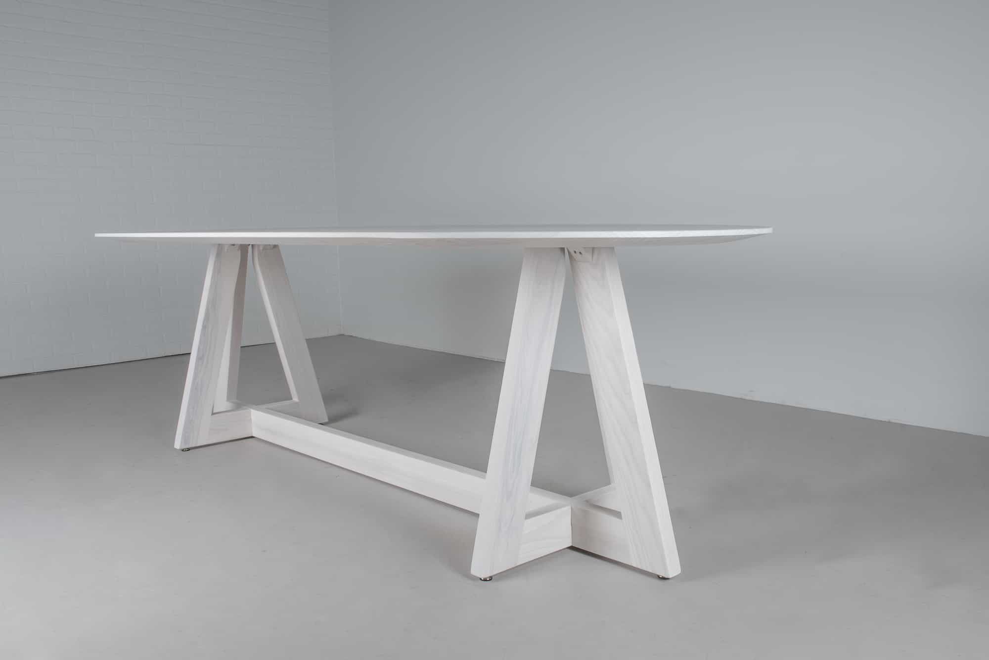 white oval table on kelly base