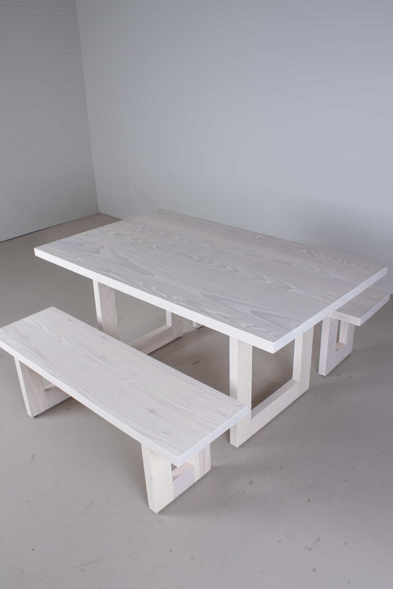 white dining table and bench