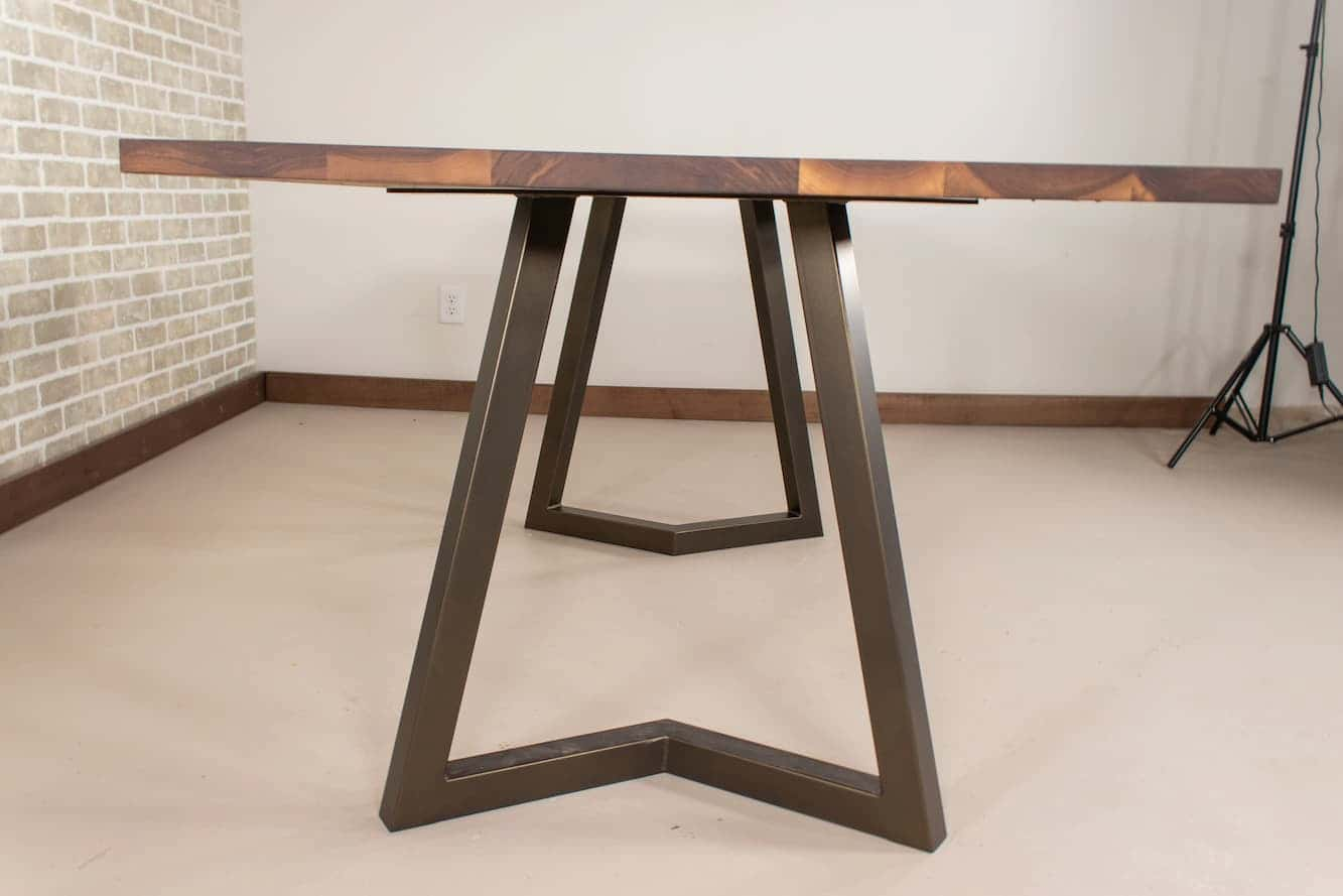 wood table on bronze chandler legs