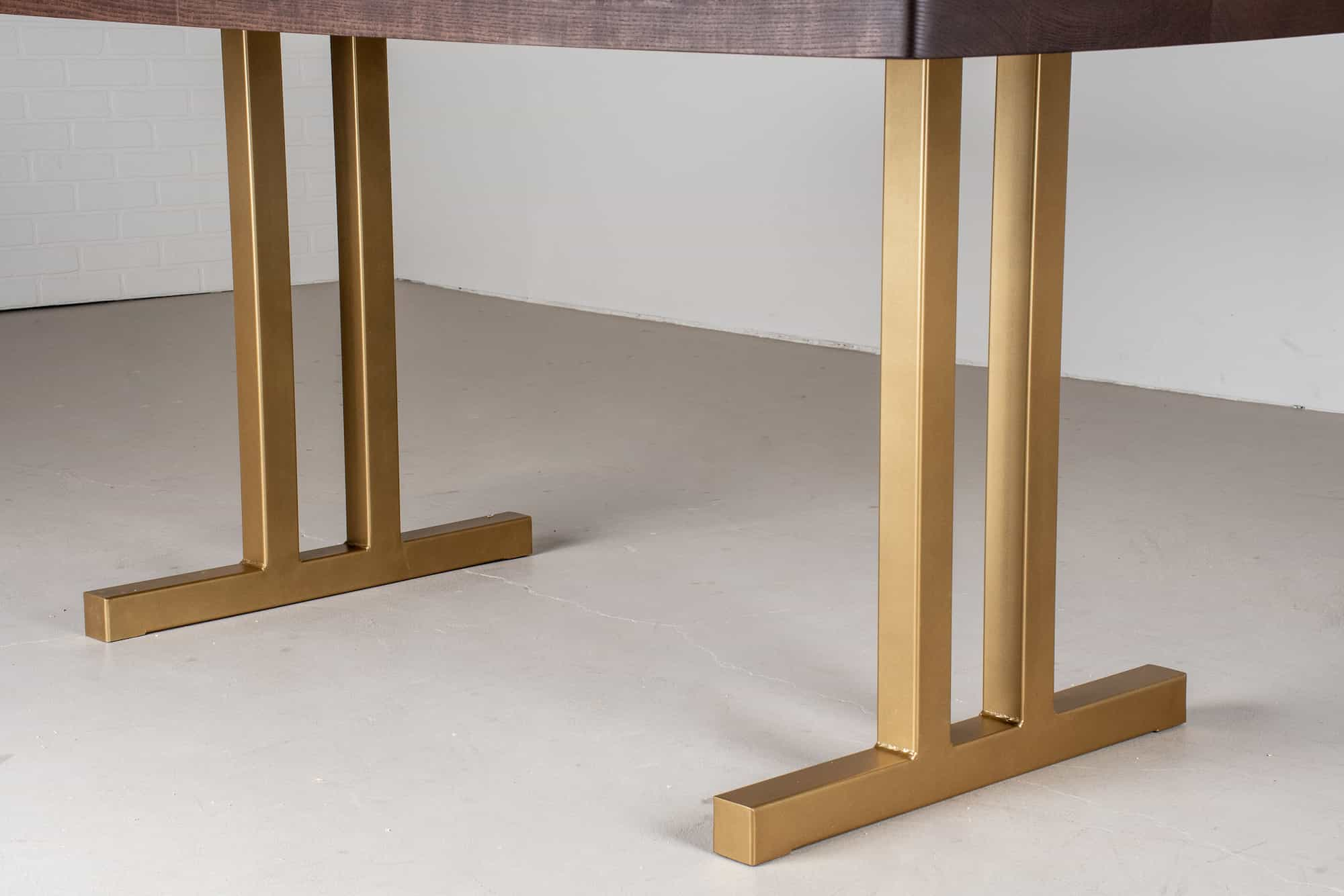 wood table on gold tuttle legs